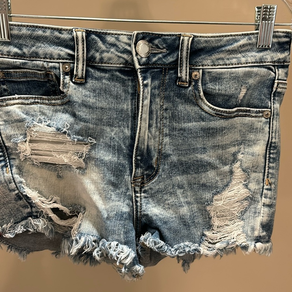American Eagle distressed shorts washed light